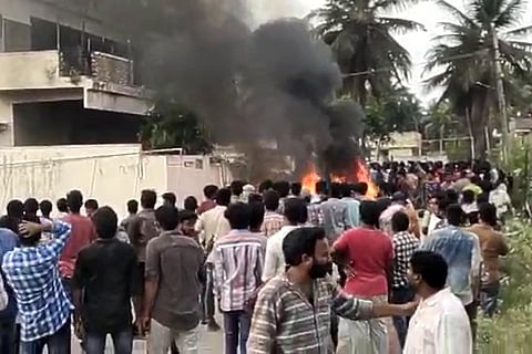 Mob that set fire to Andhra Minister P Viswarupu's house in Amalapuram