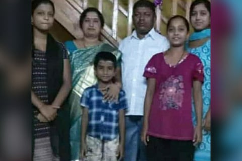 the family photo of belagavi man who died by suicide with his four children