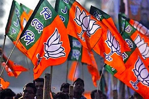 People waving BJP flags