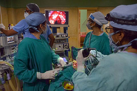 Doctors treating a patient in the operation room