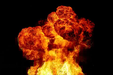 Huge flames as seen against a black backdrop