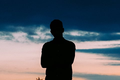 A silhouette of a man