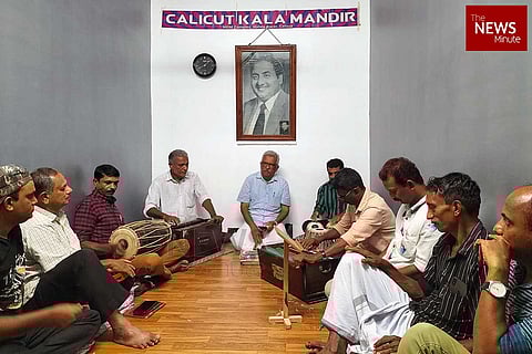 Members of Calicut Kalamandir music club gather for a music night