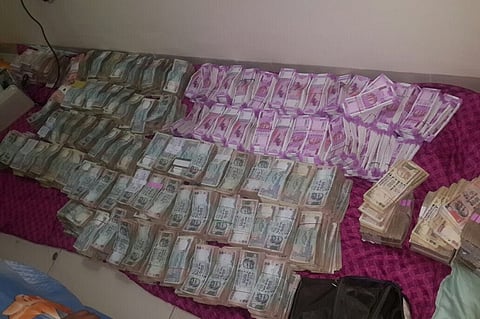 Old woman guarding cash, scooter stuffed with new notes: Stories from raid recoveries