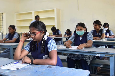 Class 12 students writing exams