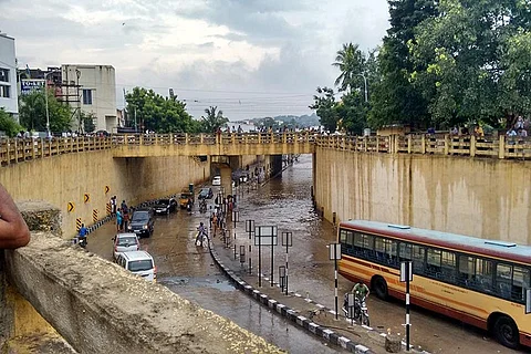 Viral Video: Chennai cheers as man rescues old woman from a bus stuck in floods