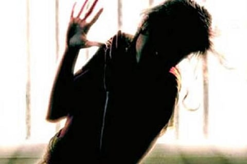 Violence against woman in silhouette