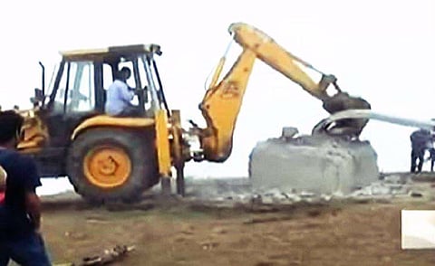 After razing of Christian cross on encroached land in Munnar, another one appears; 2 arrested