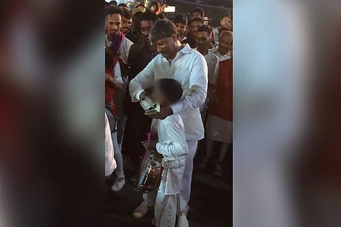 Telangana Deputy Speaker stuffs cash into child’s mouth, says it isn’t a big deal