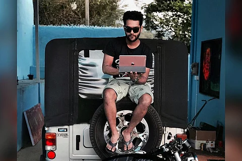 Ajith Thankachan who runs the Chrome Mental 500 page on Instagram seen sitting on a jeep here