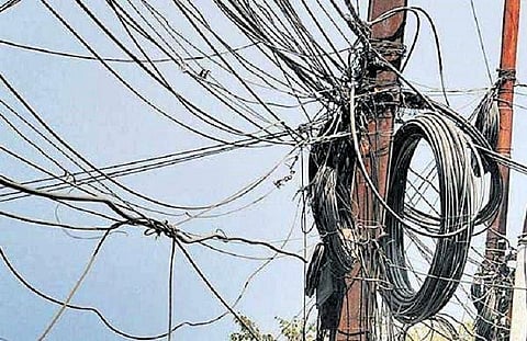 Electrical wires hung on a pole