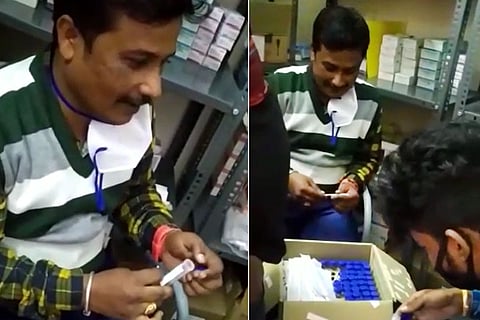 Screenshot from the video where Nagaraj and Hemanth are seen putting new swabs into the vials