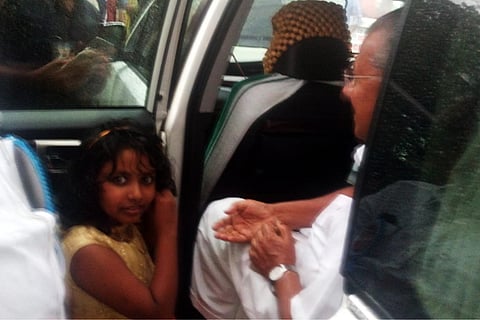 Kochi girl hands over gold earrings, piggy bank savings to CM for flood relief