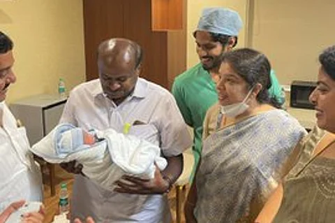 HD Kumaraswamy with his son Nikhil and newborn grandosn