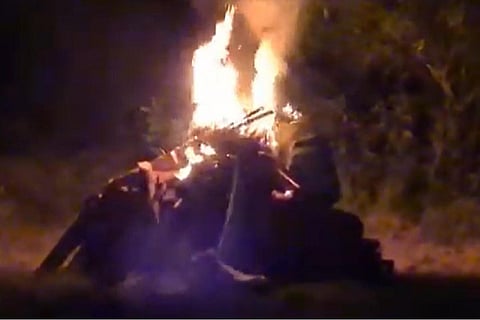 Image of Hathras gangarape victim's body burning on a pyre.