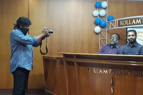 Kerala photojournalist wears black gag in protest at BJP press meet