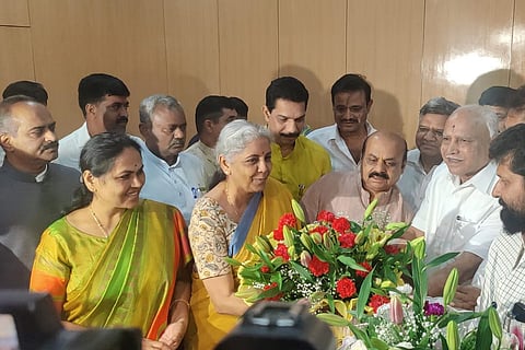 Nirmala Sitharaman with Basavaraj Bommai, BS Yediyurappa and others