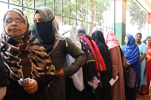 Women voters waiting to vote during the Karnataka Assembly elections