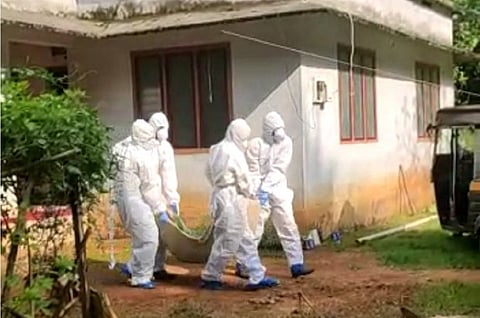 Kerala man suspected to have covid-19 carried on a sack