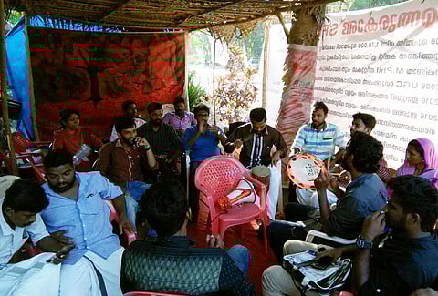 Suspended for confronting VC on fee hike, Kerala Uni research scholars on indefinite strike