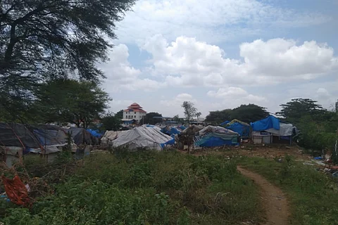 View of Karcharkanahalli slum with temple visible in the background