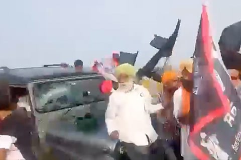 Screengrab of video showing jeep plouging into farmers from behind at Lakhimpur Kheri