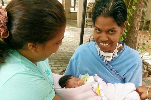Thanks to crowd-funding, a stroke-affected woman held her baby for first time