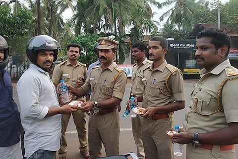 Kerala govt officials offer water and snacks to commuters, promote road safety