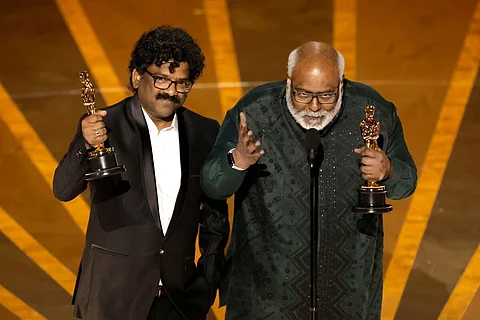 Chandrabose and MM Keeravani with the Oscar award for Naatu Naatu