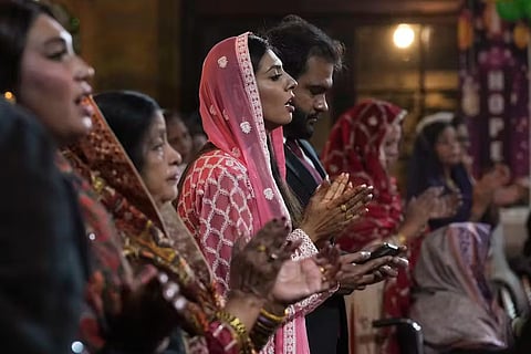 Pakistani Christians praying at a church