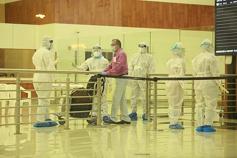A passenger arriving at Cochin airport.