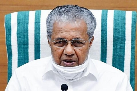 Image of Kerala CM Pinarayi Vijayan wearing mask
