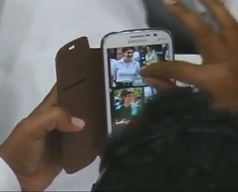 Congress Minister Ambareesh, MLA Mallikharjun caught watching dance video in assembly reportedly, BJP MLAs demand resignation