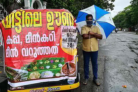 Prakash with his auto rickshaw