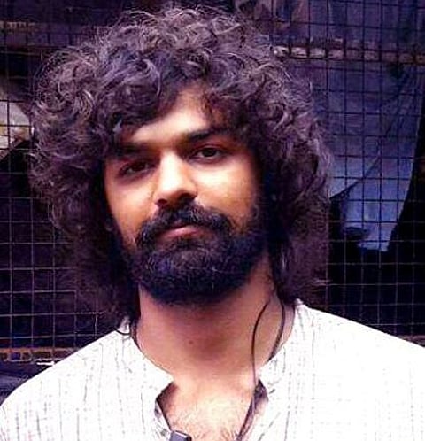 Fans queue up to click pictures with assistant director Pranav