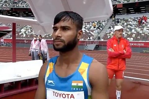 Praveen Kumar wearing a sleeveless India jersey at the Paralympics in Tokyo