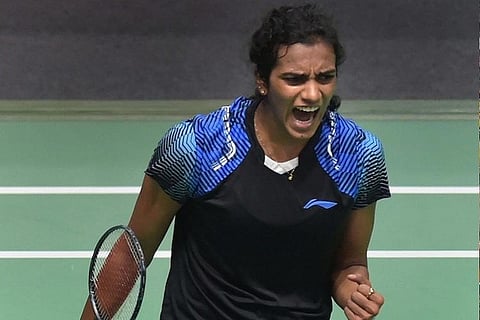 PV Sindhu celebrating winning a point with a fist pump