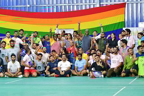 Organisers and participants at the Queer Badminton League tournament