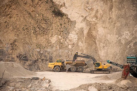 An excavator in a quarry