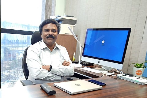 Santhosh Babu at his office