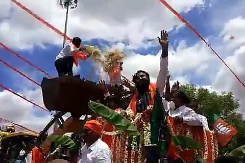 K’taka Health Min Sriramulu takes part in large procession without mask, distancing