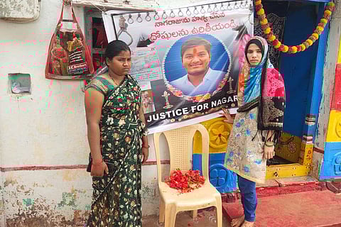 Nagaraju's sister Ramadevi and wife Sultana with a poster demanding justice for Nagaraju.