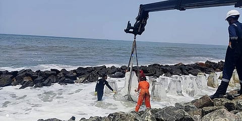 Tetrapod seawall under construction in the Chellanam region