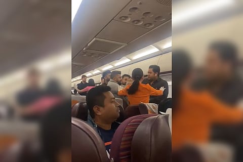 Screengrab from the video of the scuffle between passengers