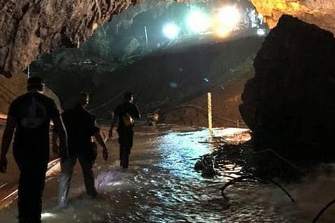 Divers rescue all 12 Thai boys and coach trapped inside cave in miraculous effort