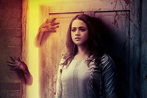 Bhavana in the poster for the film The Door