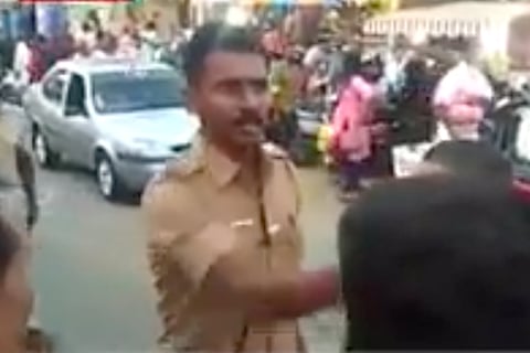 Watch: TN cop stands up to protesters threatening to damage bus during Kerala hartal