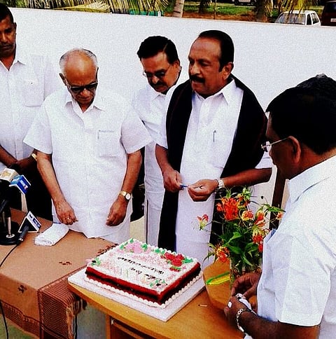 Cutting a cake to celebrate LTTE chief Prabhakaran's 60th birth anniversary