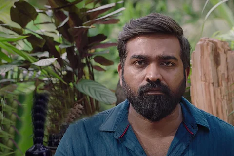 Vijay Sethupathi dressed in blue shirt