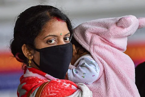 A mother with a baby